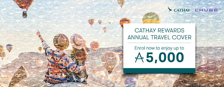 A couple with hot air balloon background.